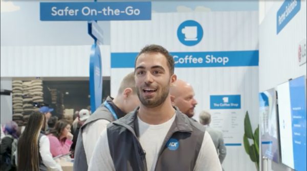 picture of david speaking in front of an ADT booth