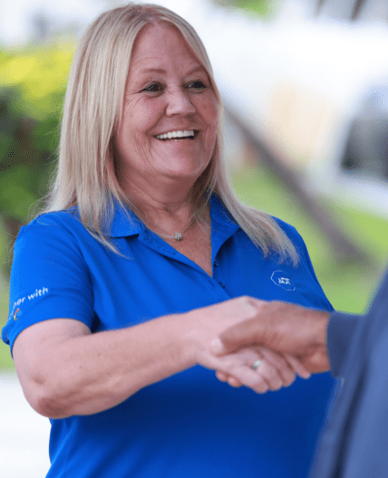 Sales Representative A sales representative shaking a customer's hand.